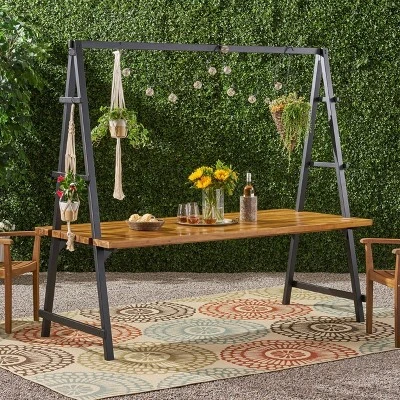 Huckleberry Rectangle Acacia Wood Patio Dining Table With Iron Plant Hanger Teak/Black - Christopher Knight Home 1 Huckleberry Rectangle Acacia Wood Patio Dining Table With Iron Plant Hanger Teak/Black - Christopher Knight Home